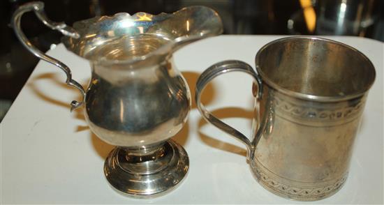 Silver mug and a cream jug